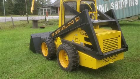 new holland l555 skid steer attachments|new holland l555 engine specs.